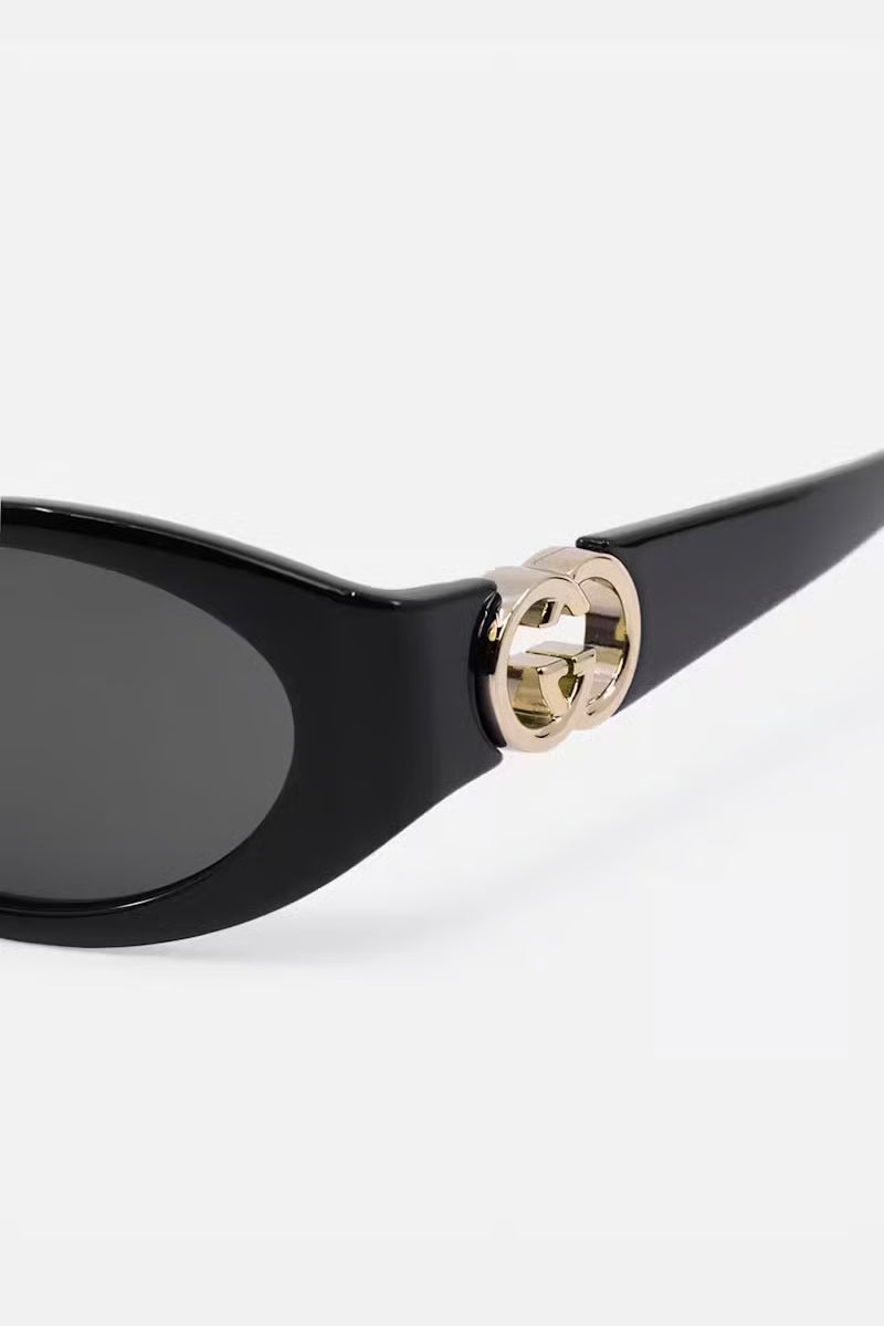 Gucci GG Black acetate sunglasses with gold-tone interlocking G hardware