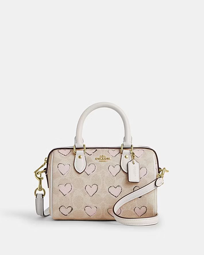 Mini Rowan Crossbody Bag In Blocked Signature Canvas with heart print
