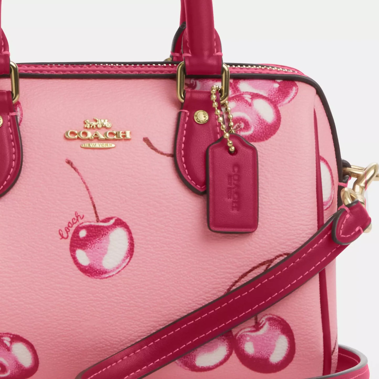 Coach mini rowan crossbody with cherry print