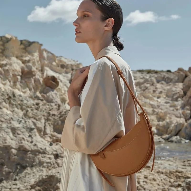 Polène Numéro Dix, a crescent-shaped leather bag