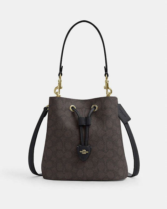 Rowan Bucket Bag In Signature Canvas