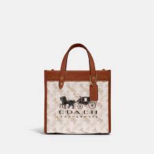 Coach Cream Square Field Tote With Horse And Carriage Print And Carriage Badge